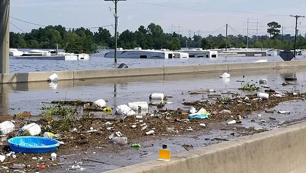 Latest Texas flood news (Sunday): Liberty residents cut off by Trinity ...