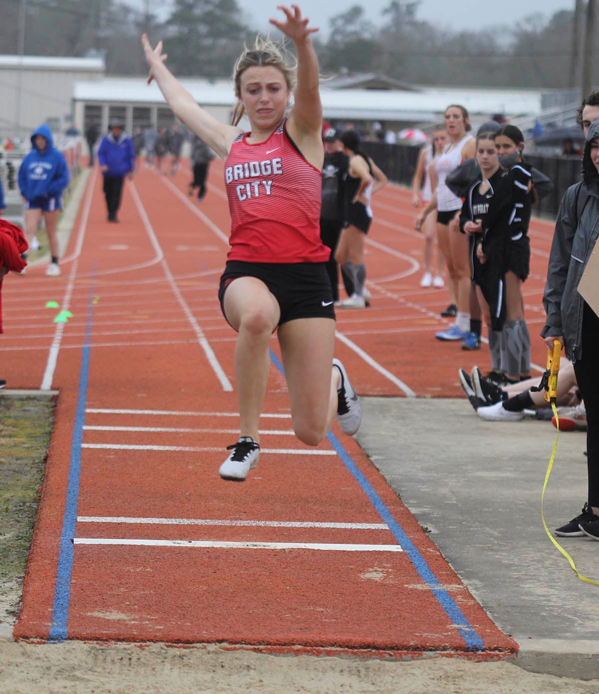 Bobcat boys, Cardinal girls roll to Bobcat Relay team titles Orange