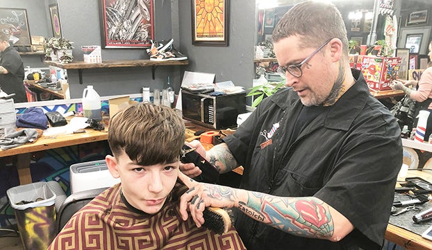 Organization teams with local barber shops to provide free back-to