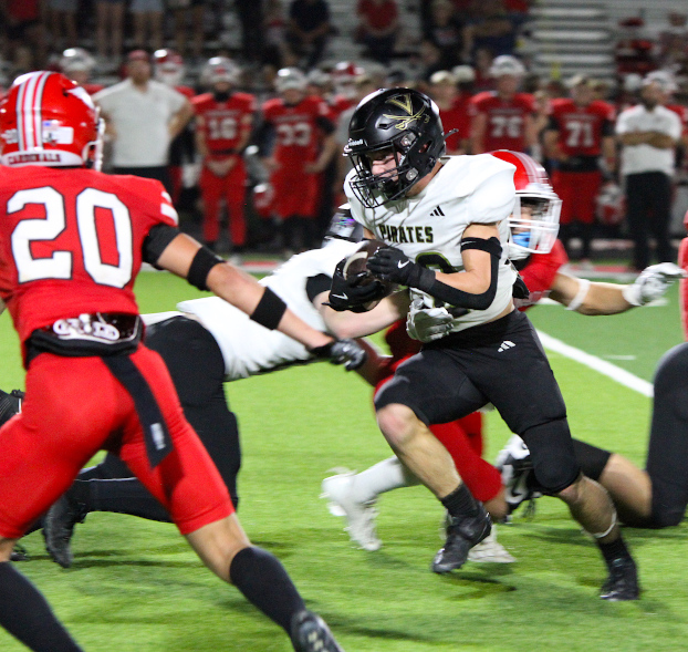 Vidor running back Marcus Harris (22) goes for a nice gain in the second-half of Friday’s game against Bridge City. (Tommy Mann/Special to the Orange Leader)