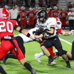 Vidor running back Marcus Harris (22) goes for a nice gain in the second-half of Friday’s game against Bridge City. (Tommy Mann/Special to the Orange Leader)